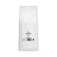 Close-up of Cameron's Coffee Brazil whole beans showing roast color and smooth texture