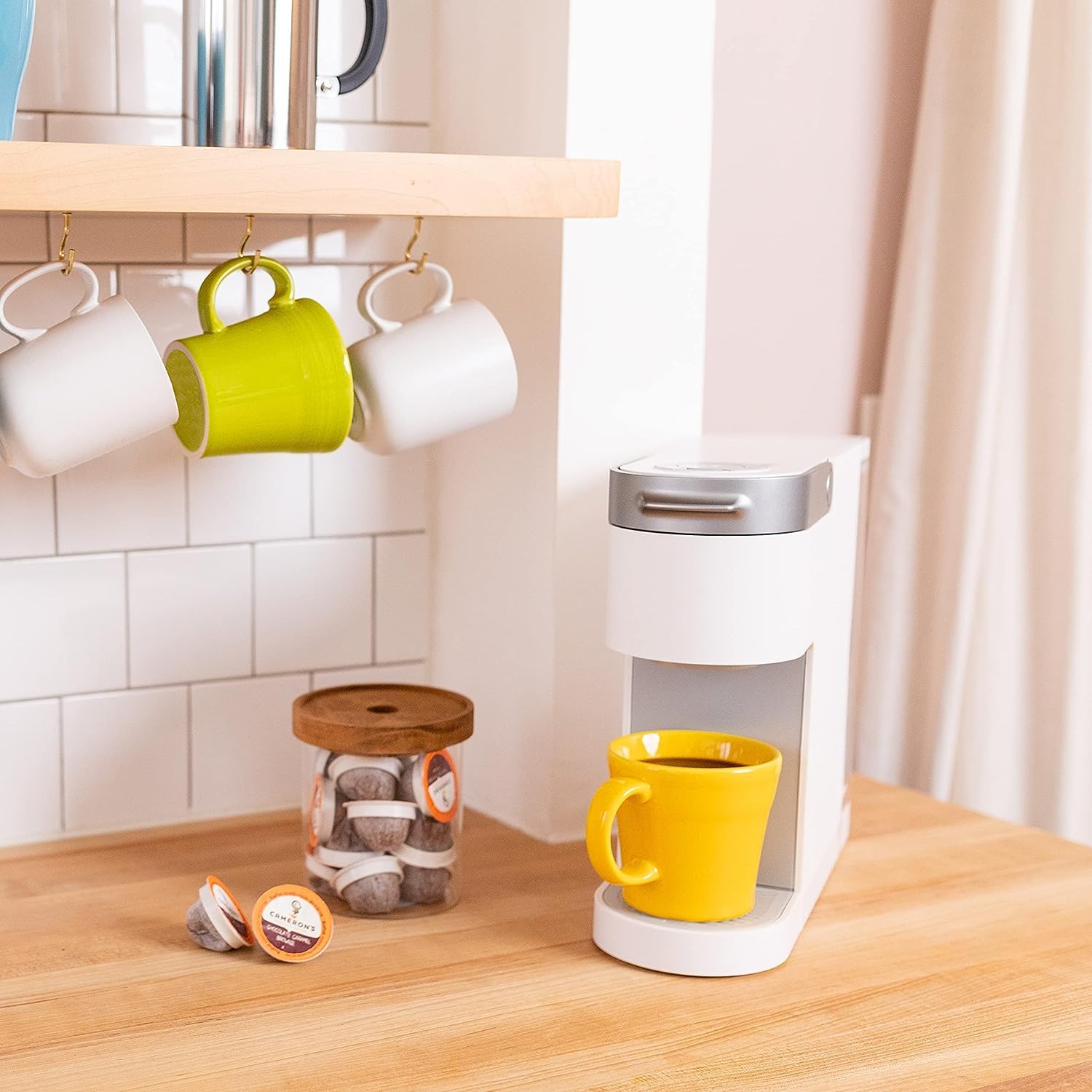 Cameron's Coffee cup on kitchen counter showing easy everyday brewing benefit