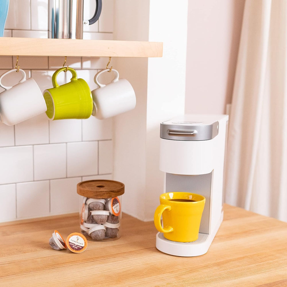 Cameron's Coffee cup on kitchen counter showing easy everyday brewing benefit