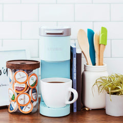Cameron's Coffee pod placed in single serve brewer for quick convenience