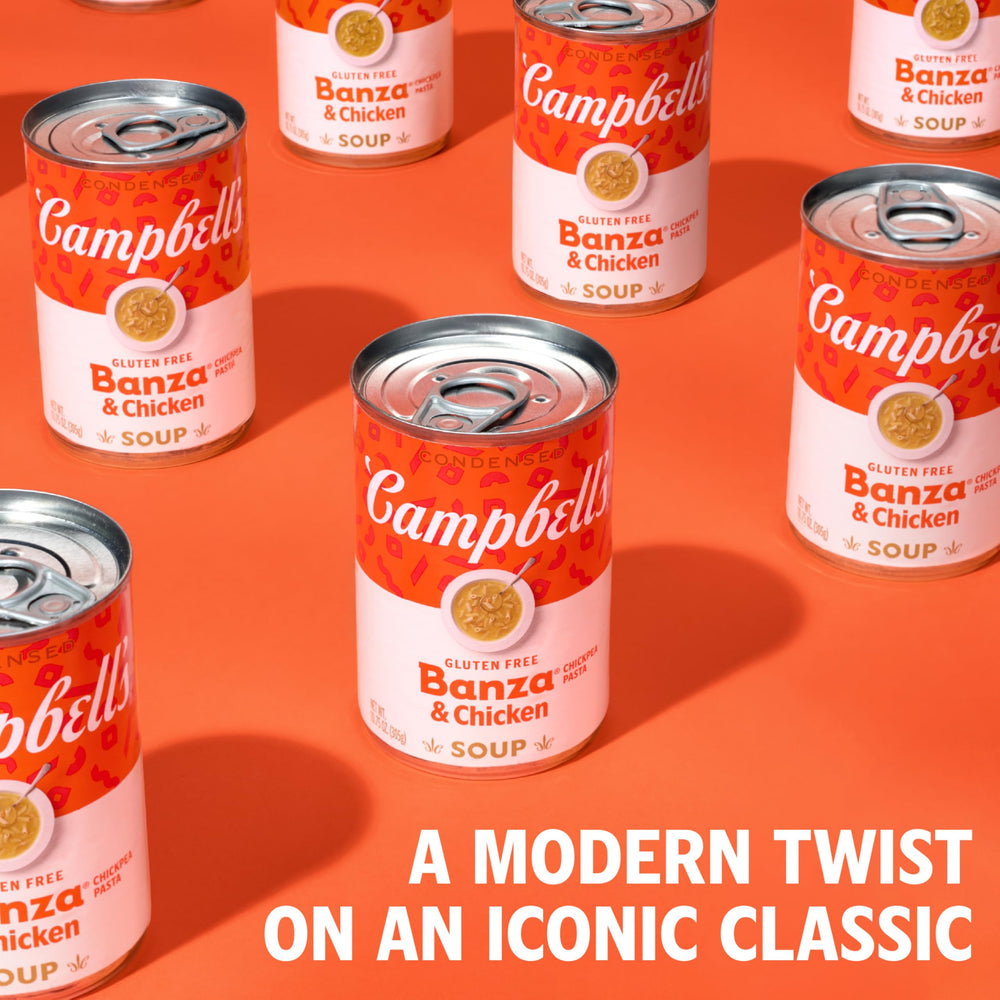 Twelve Campbell's cans stacked in pantry showing bulk storage and convenience benefit