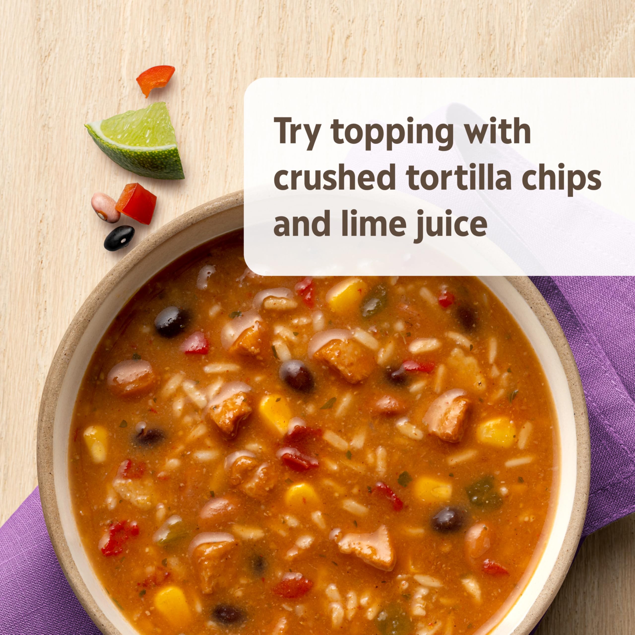 Campbell's Homestyle can beside an apple for scale, demonstrates single-serving size