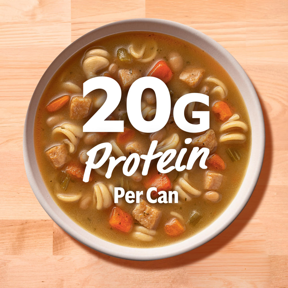 Campbell's arranged ingredients—chicken, rotini, carrots, beans highlighting quality