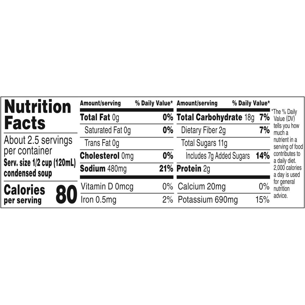Campbell's open can close-up reveals smooth tomato texture and ready-to-heat benefit