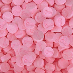 Canada close-up of pink wintergreen lozenge texture showing soft dissolve for gentle flavor