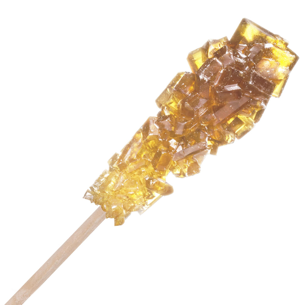 Candy Envy stick next to a ruler and sugar cubes to show size and 2.5-cube equivalent