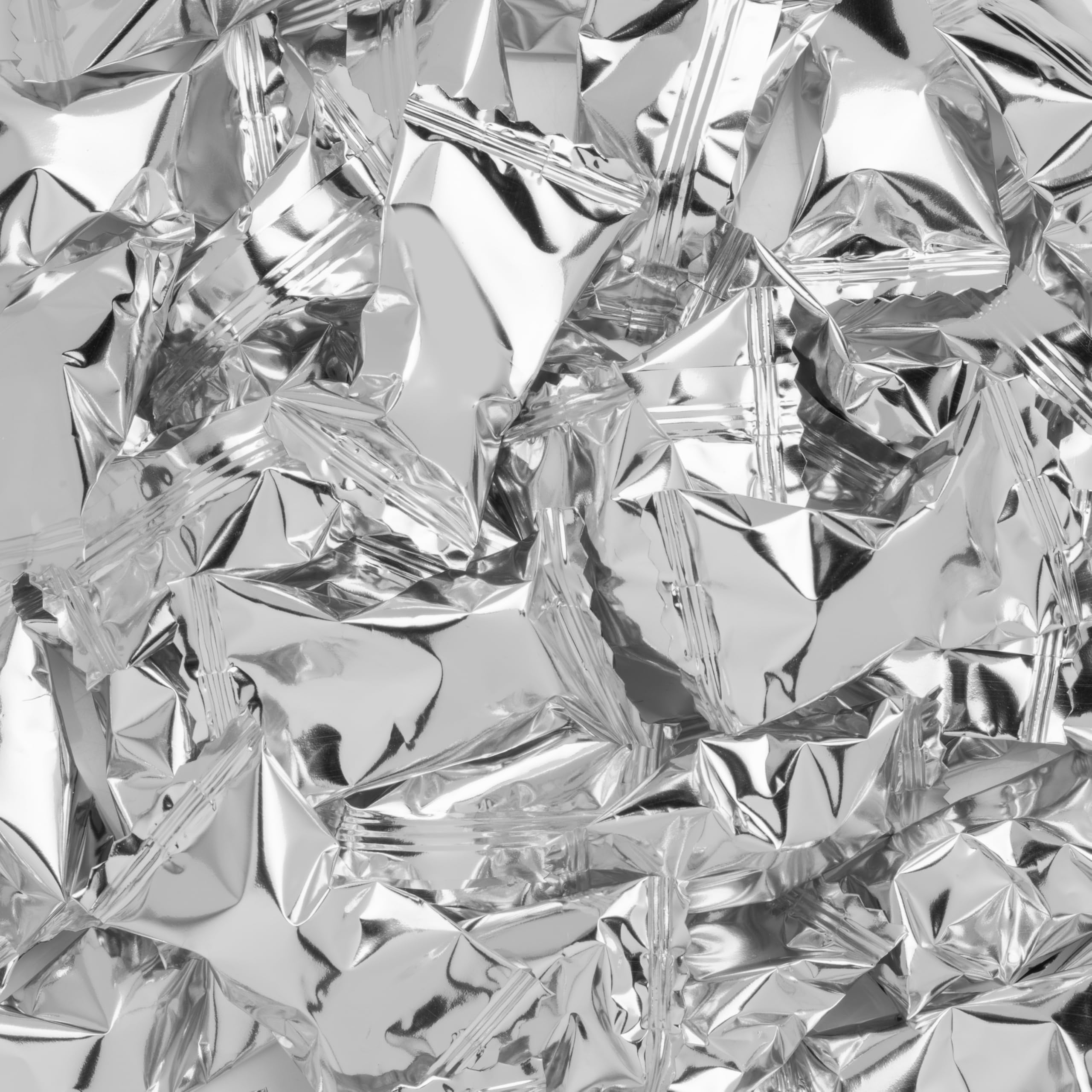 Candy Envy close-up of silver foil texture highlighting premium shine and protective wrap