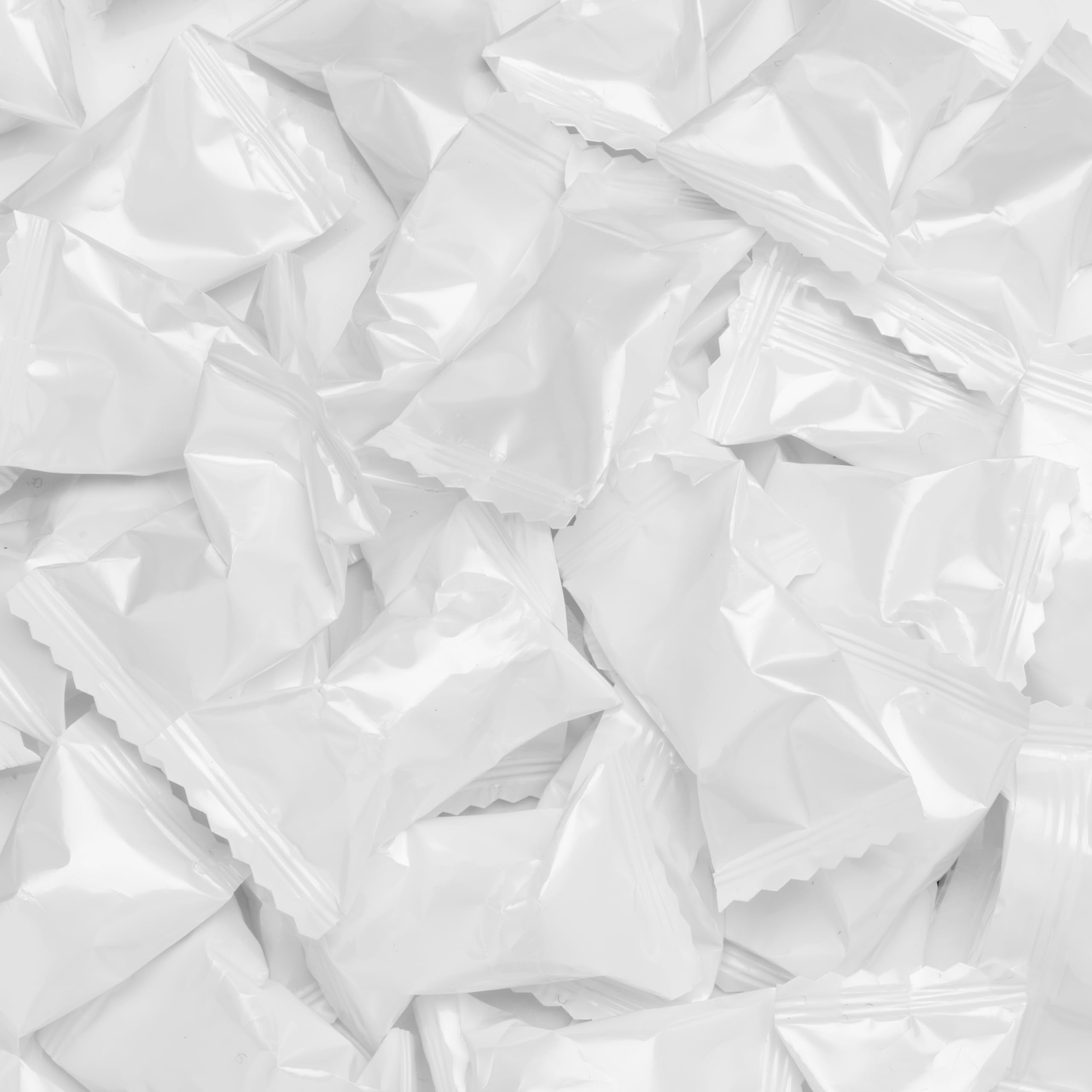 Candy Envy open 13 oz bag top view with individually wrapped mints for easy serving