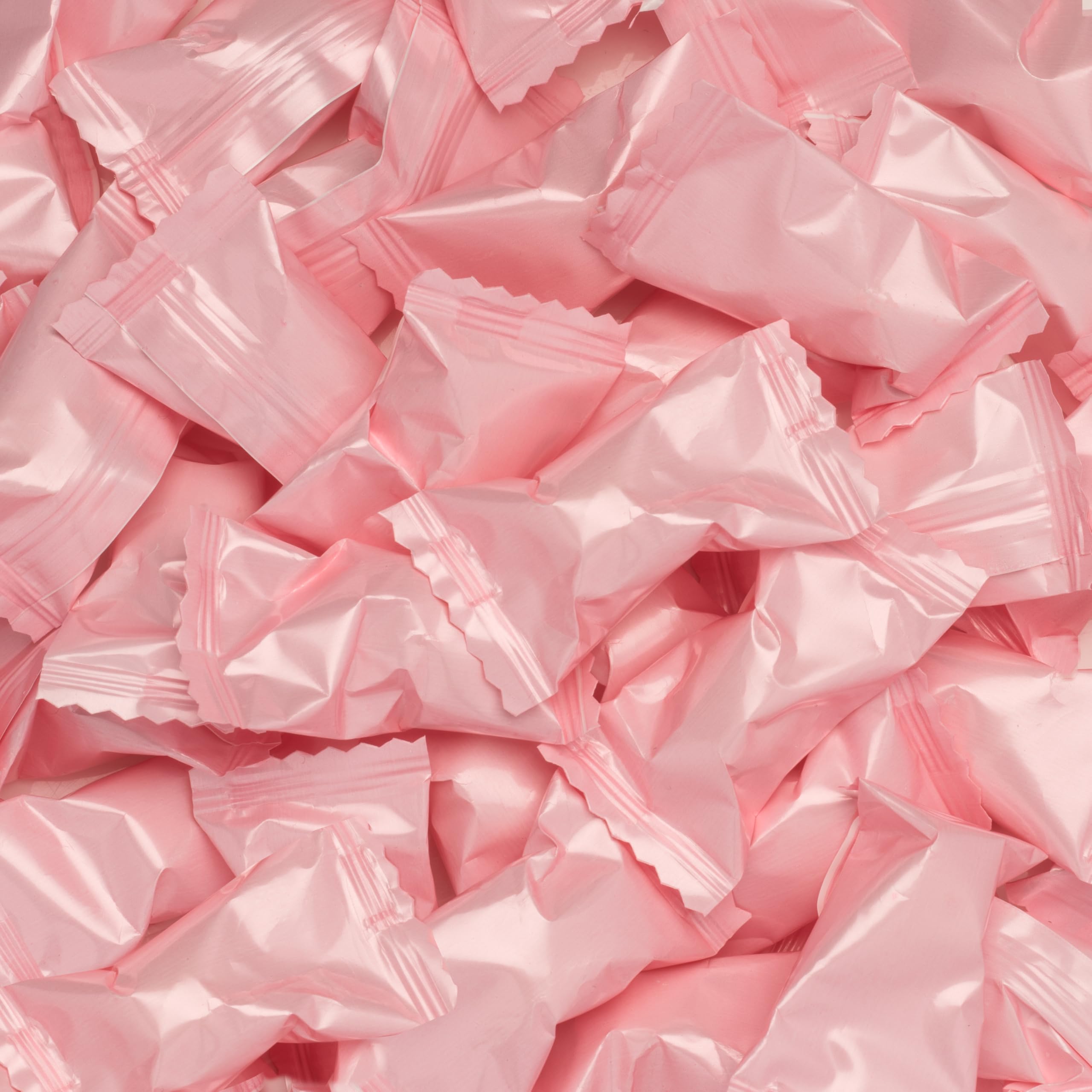 Candy Envy close-up of mints showcasing smooth texture and pleasant melt