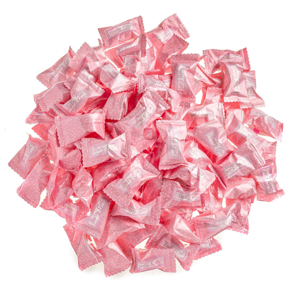 Candy Envy mints beside a ruler to show approximate size