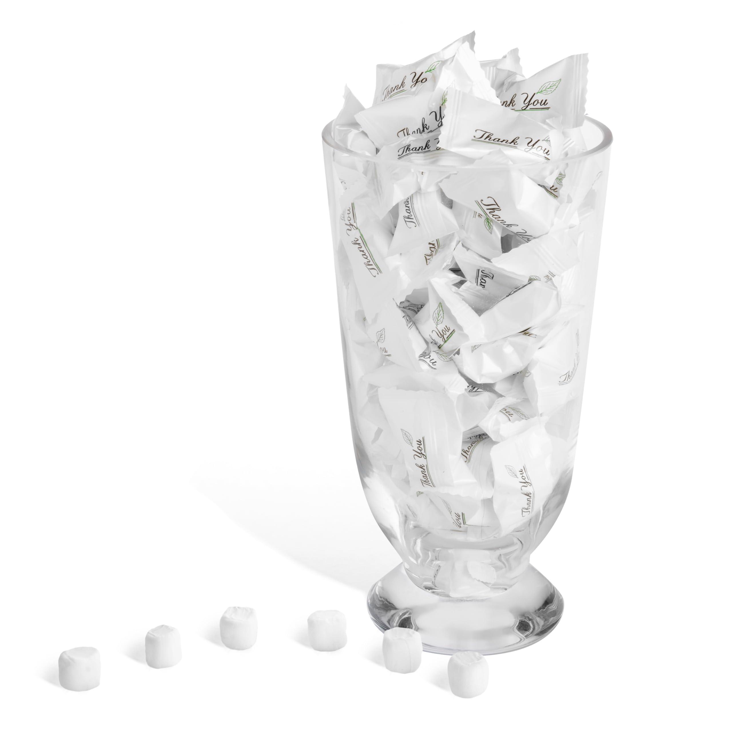 Candy Envy table display at a wedding reception adding elegant, pre-wrapped guest favors