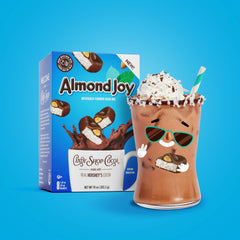 Candy Shop single 1.25oz packet beside a mug, quick single-serve convenience