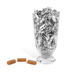 Candy Envy bowl display with silver-wrapped caramels for elegant event decor