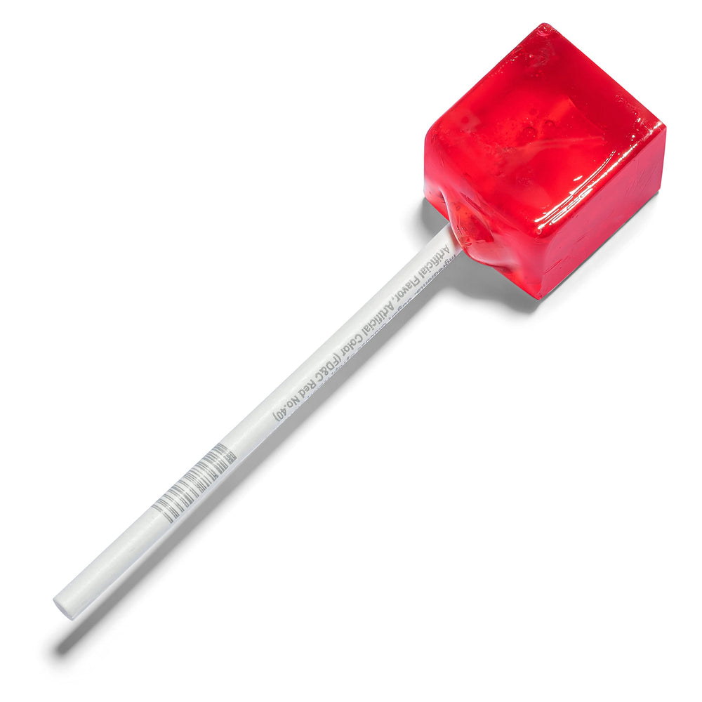 Candy Envy lollipop held in hand showing 1-inch cube size and easy-grip stick