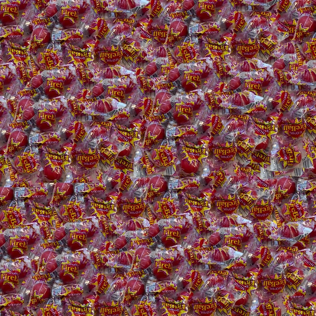 CandyKrave Atomic Fireballs arranged on a party table offering shareable fiery-sweet treats