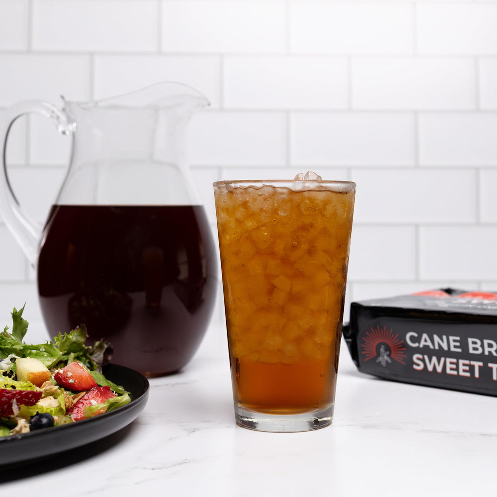 Cane Brew bag in a cooler at the beach showing portability and outdoor use