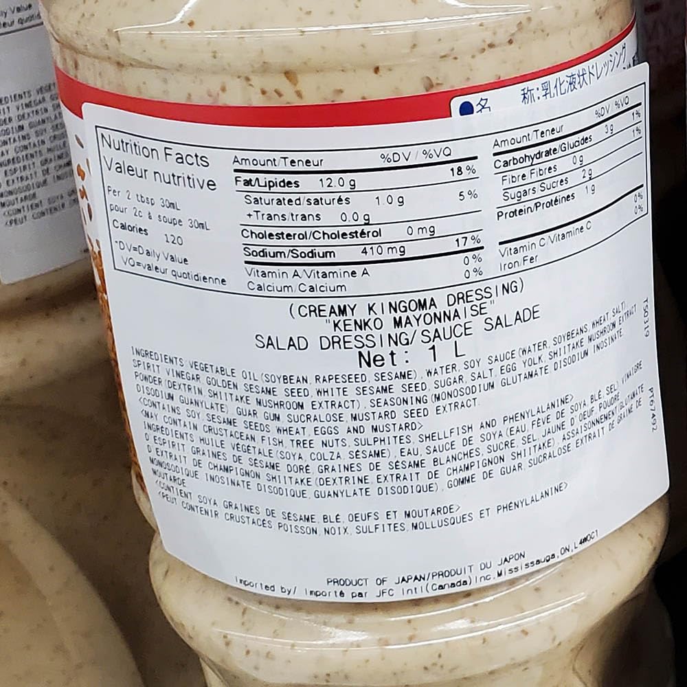 CARALARGA dressing poured over greens, adds creamy sesame flavor