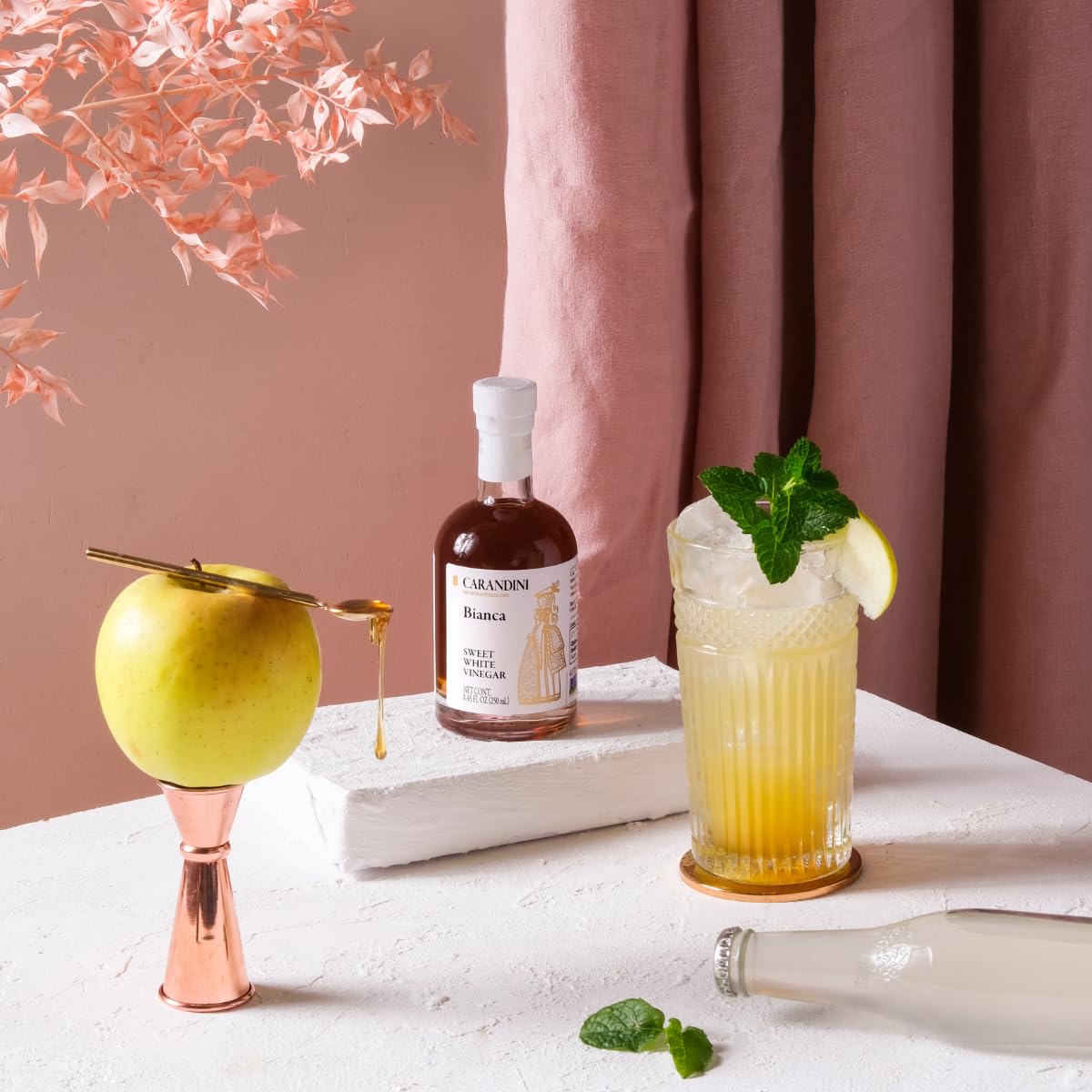 Carandini Bianca stored in a kitchen cupboard demonstrating space-saving bottle convenience