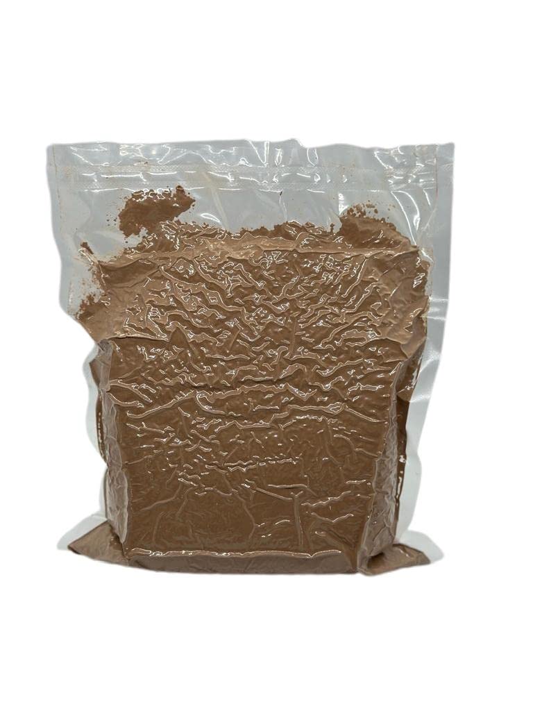 Warm mug of cocoa made with Caribbean Coastal Delights cacao powder showing comforting pure chocolate taste