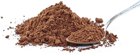 Kitchen scale measuring Caribbean Coastal Delights cacao powder portion for precise baking control