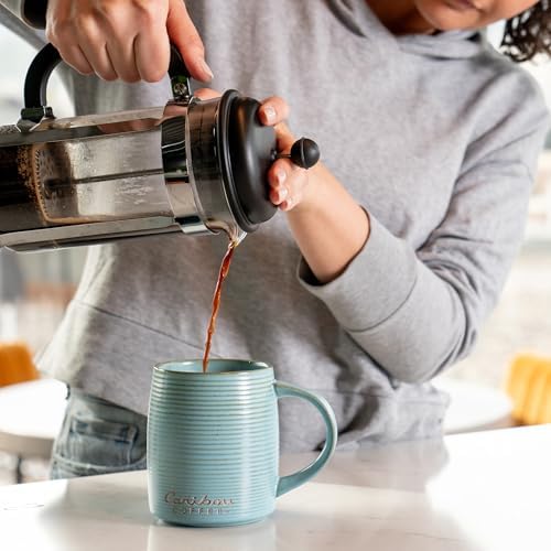 Caribou Coffee hand-packed roaster in Minneapolis emphasizing small-batch quality
