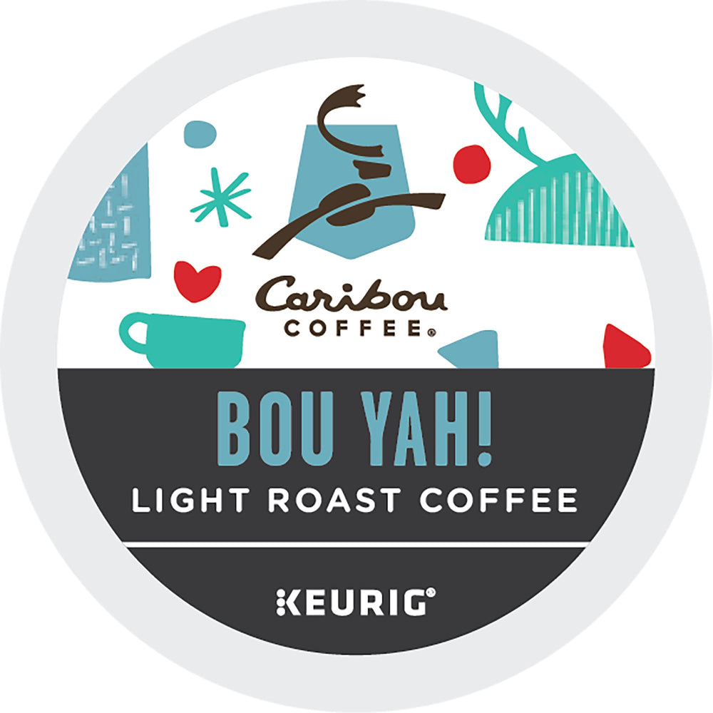 Cup beside a K-Cup for scale showing single-serve portion from Caribou Coffee