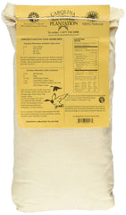 Carolina Plantation creamy cooked grits plated with shrimp and garnish for rich flavor