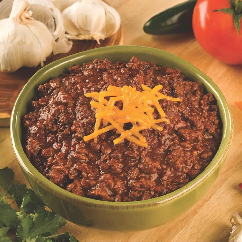 Two-pound meat scale beside prepared chili to show serving size and Carroll Shelby's kit yield per box