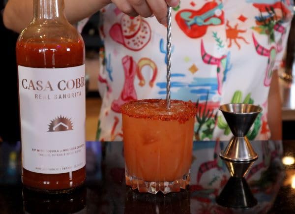 Casa Cobre paired with tequila glass illustrating complementary cocktail pairing