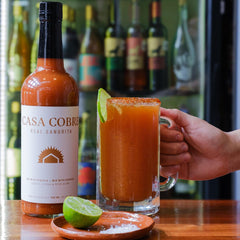 Casa Cobre being poured into a glass demonstrating easy ready-to-use mixer