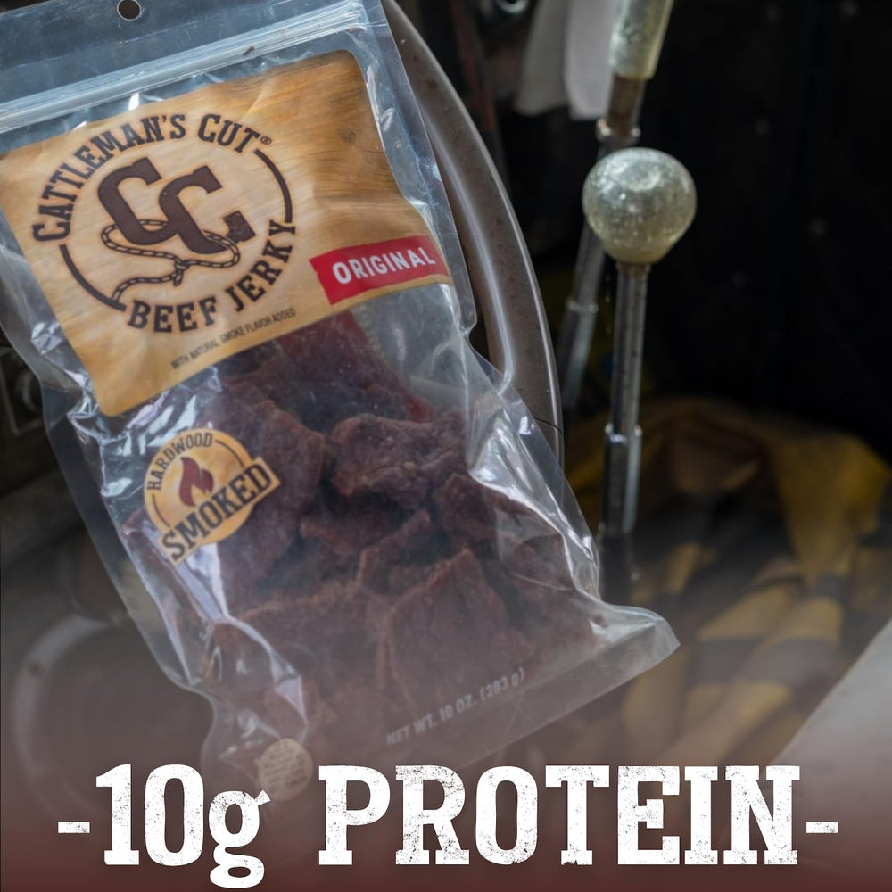 Cattleman's Cut open bag with pieces on wood board showing grab-and-go portioning