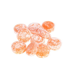 Close-up of Cavendish orange drops texture and shine — clear fruit flavor promise