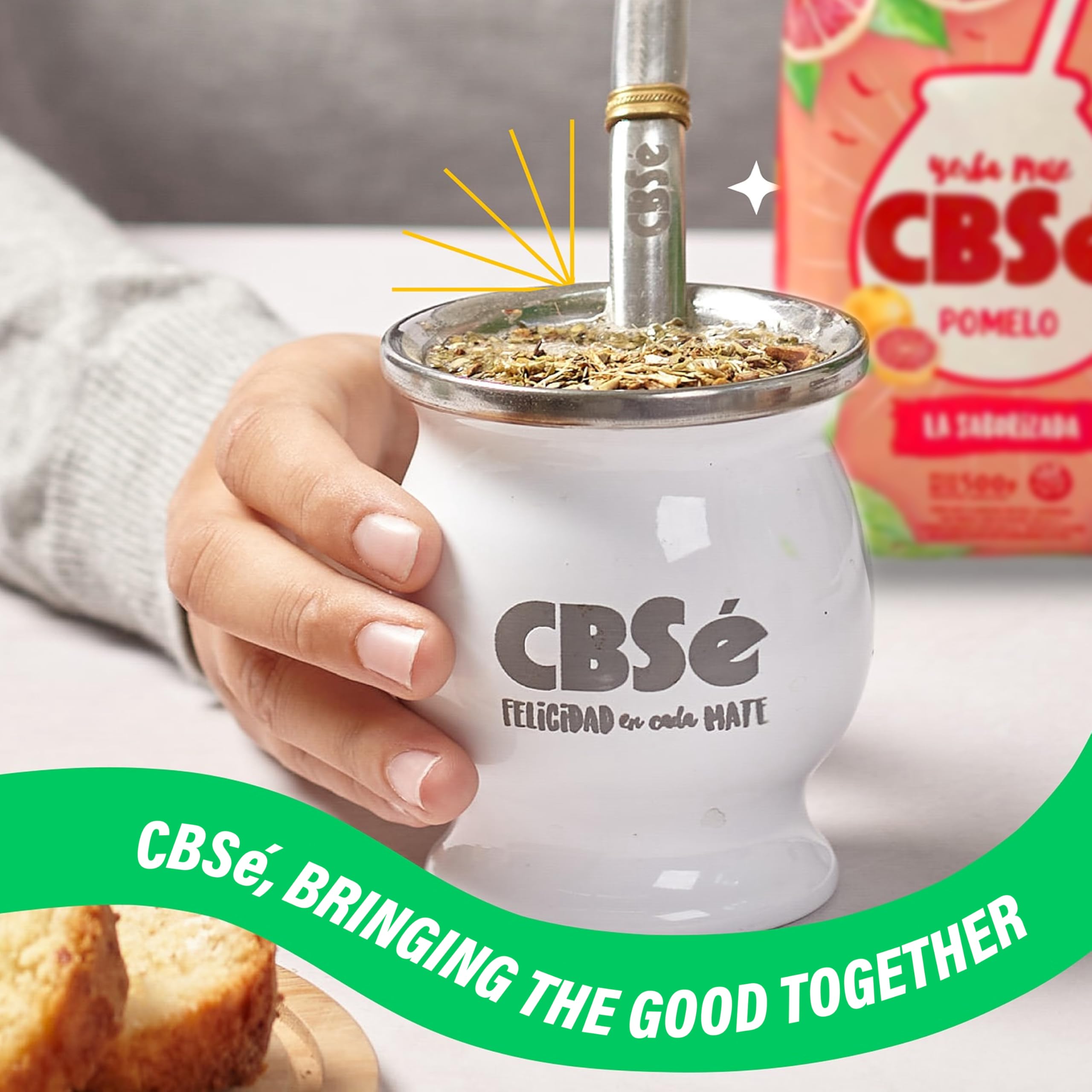 CBSe iced yerba mate in a glass with ice and grapefruit garnish for refreshing drinking