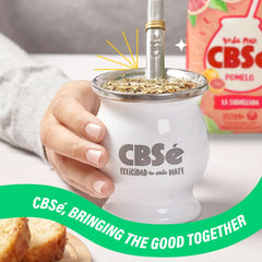 CBSe iced yerba mate in a glass with ice and grapefruit garnish for refreshing drinking