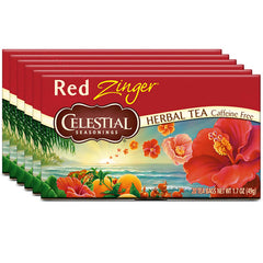 Pitcher of iced Celestial Seasonings Red Zinger with glasses, refreshing beverage ready to serve