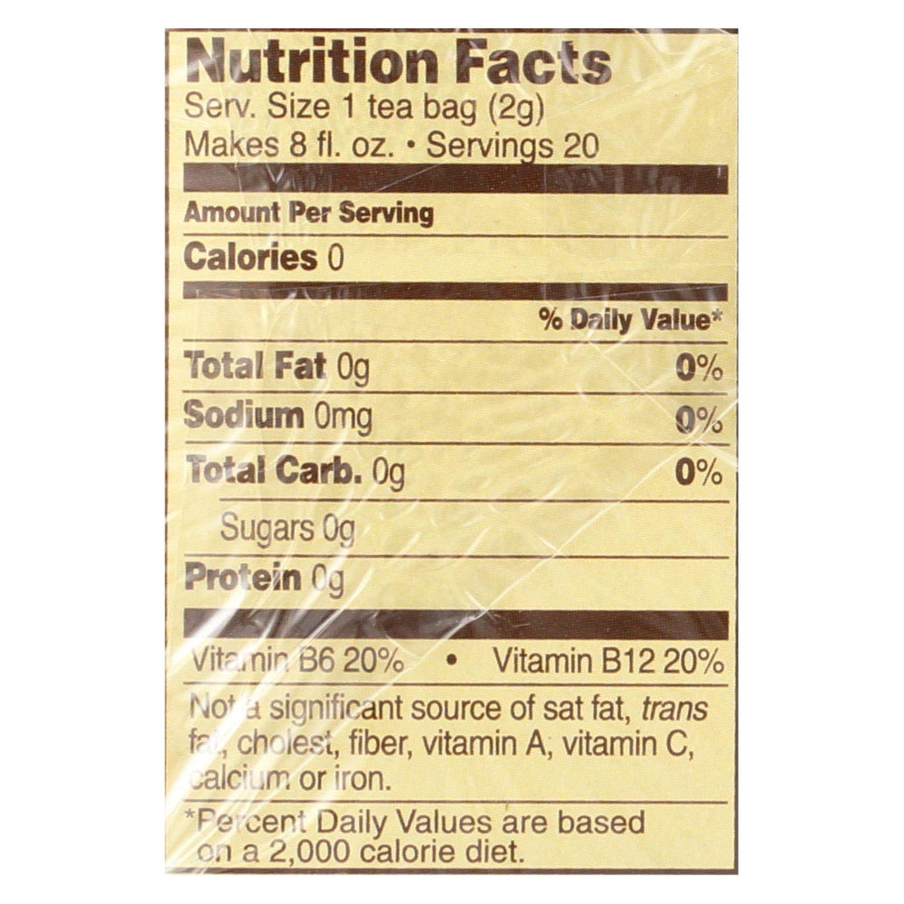 Celestial Seasonings tea bag close-up with brewed cup, showing aroma and easy brewing