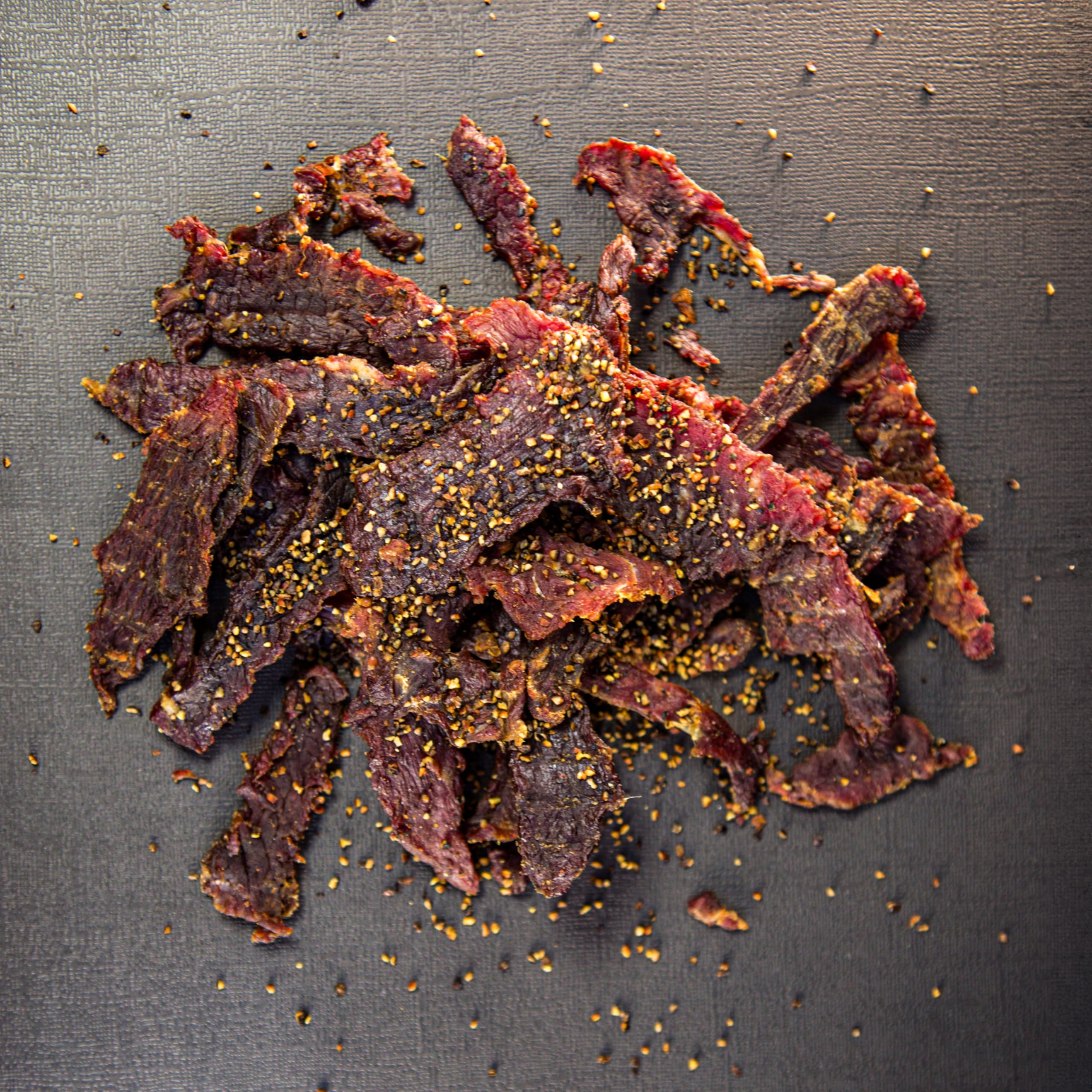 Centennial Cuts sliced jerky on plate demonstrating protein-rich snack appeal