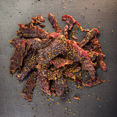 Centennial Cuts sliced jerky on plate demonstrating protein-rich snack appeal