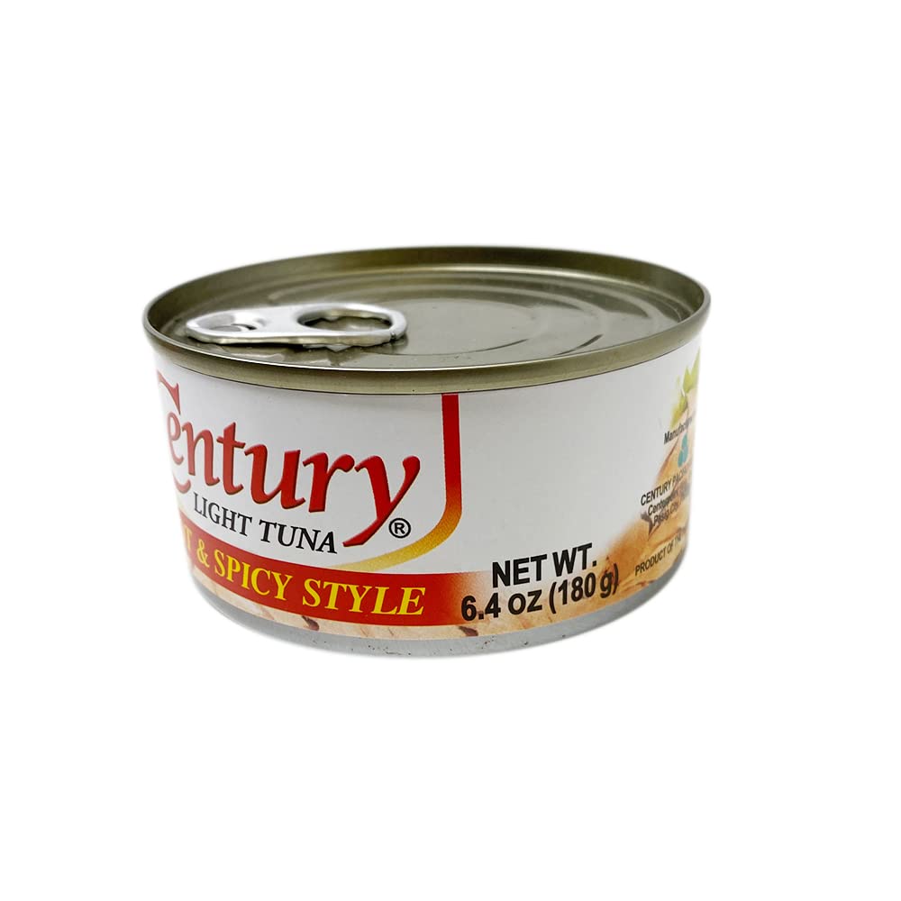 Century Tuna close-up of flake texture highlighting meaty, oil-coated flakes