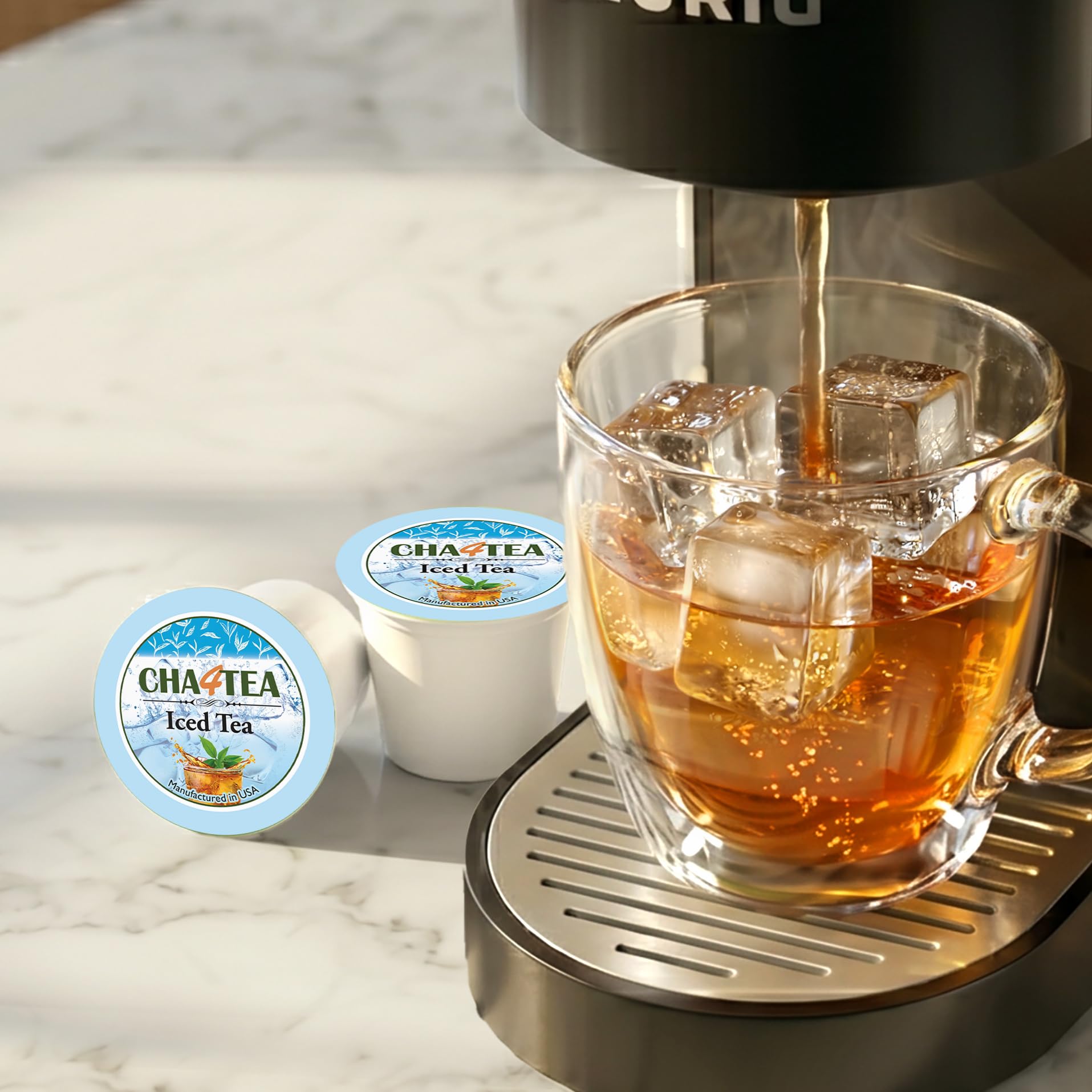 Cha4TEA iced tea in a glass in a kitchen setting showcasing refreshing clarity