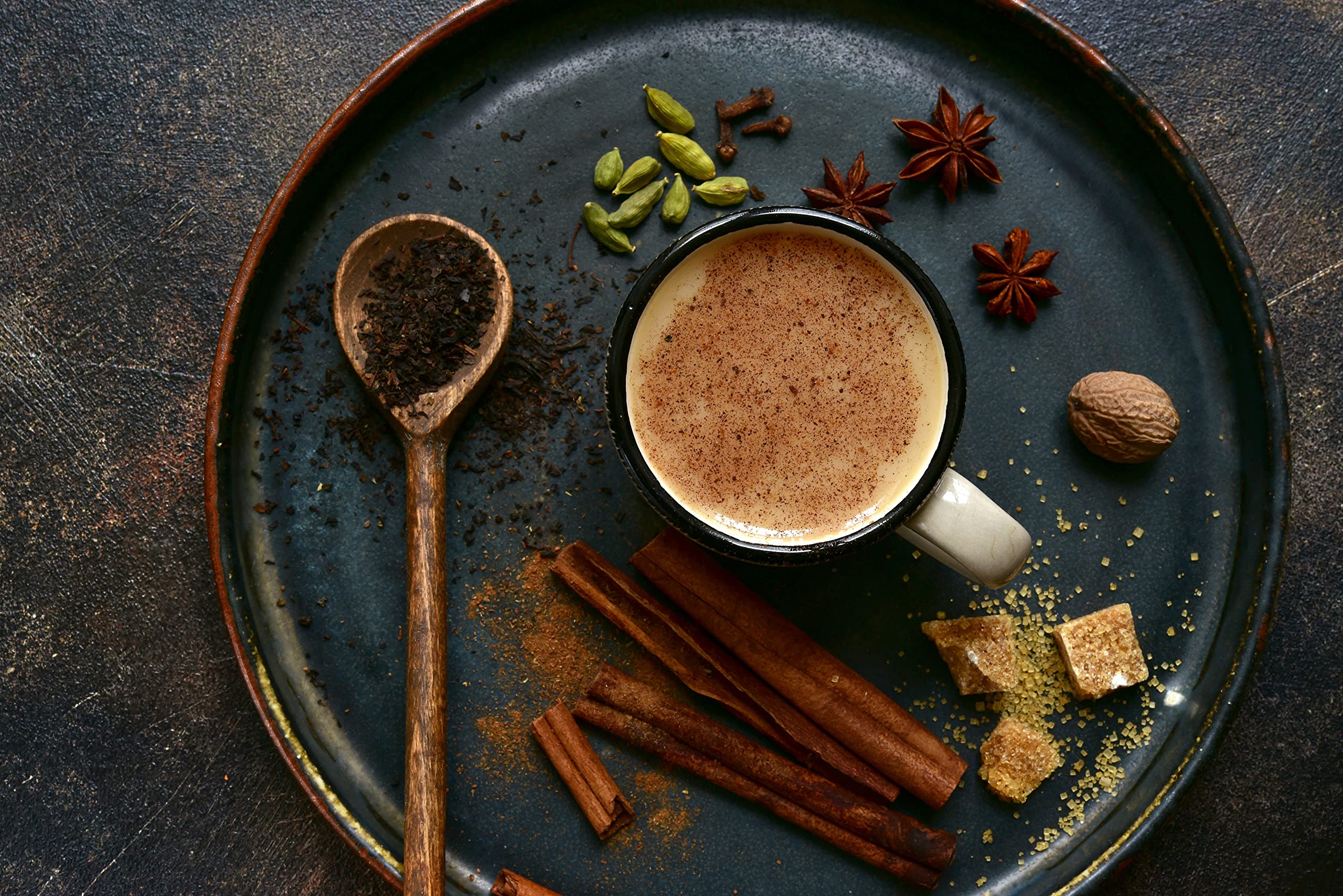 Cha4TEA spices close-up with cinnamon and cardamom showcasing natural ingredients