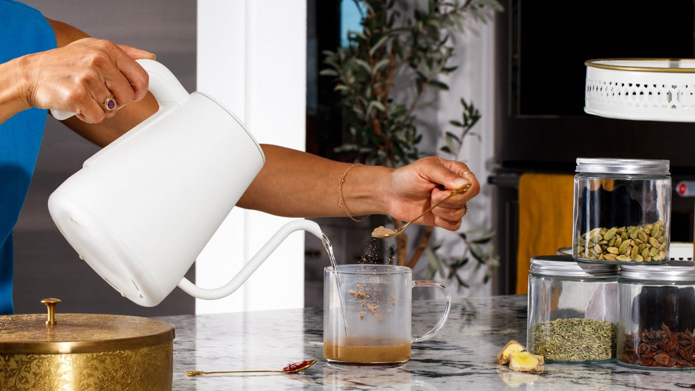 Chai Tonics frothed latte in mug showing creamy texture and comforting sip