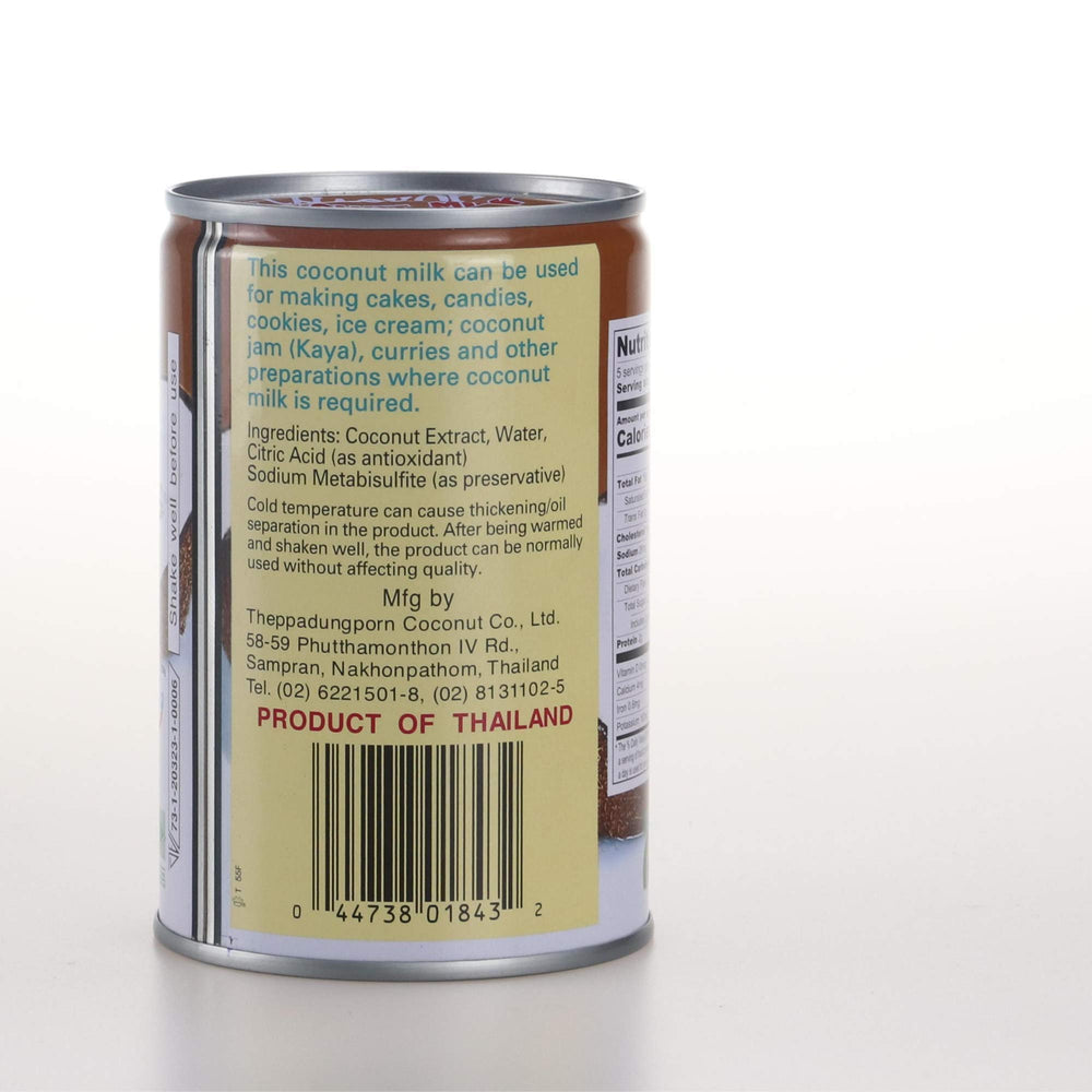 Chaokoh can next to hand showing size and pantry-ready convenience