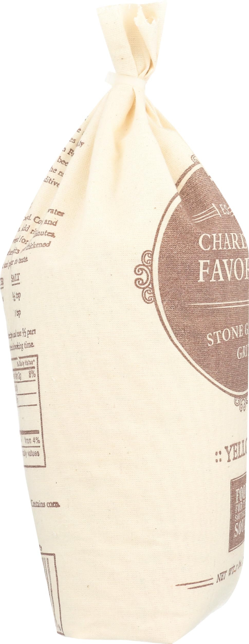 Charleston spoonful of cooked grits with scale to show serving size and texture