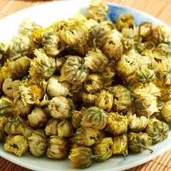 ChaWuWarmSun brewed cup with golden floral tea, bright aroma visible