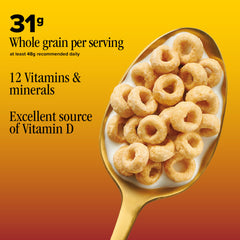 Cheerios cup with milk being poured showing quick breakfast convenience