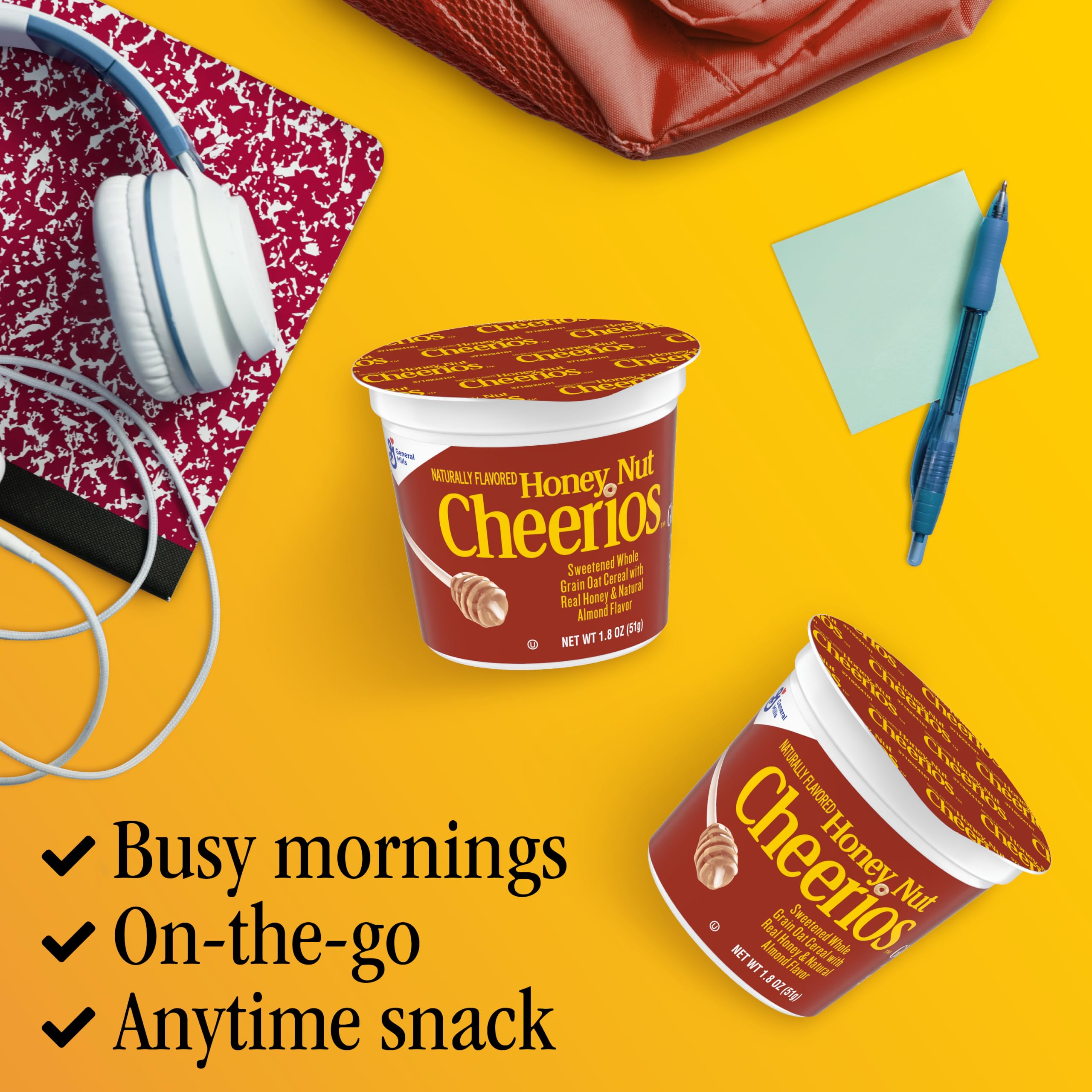 Cheerios cup held in hand showing 1.8 oz size for portion control