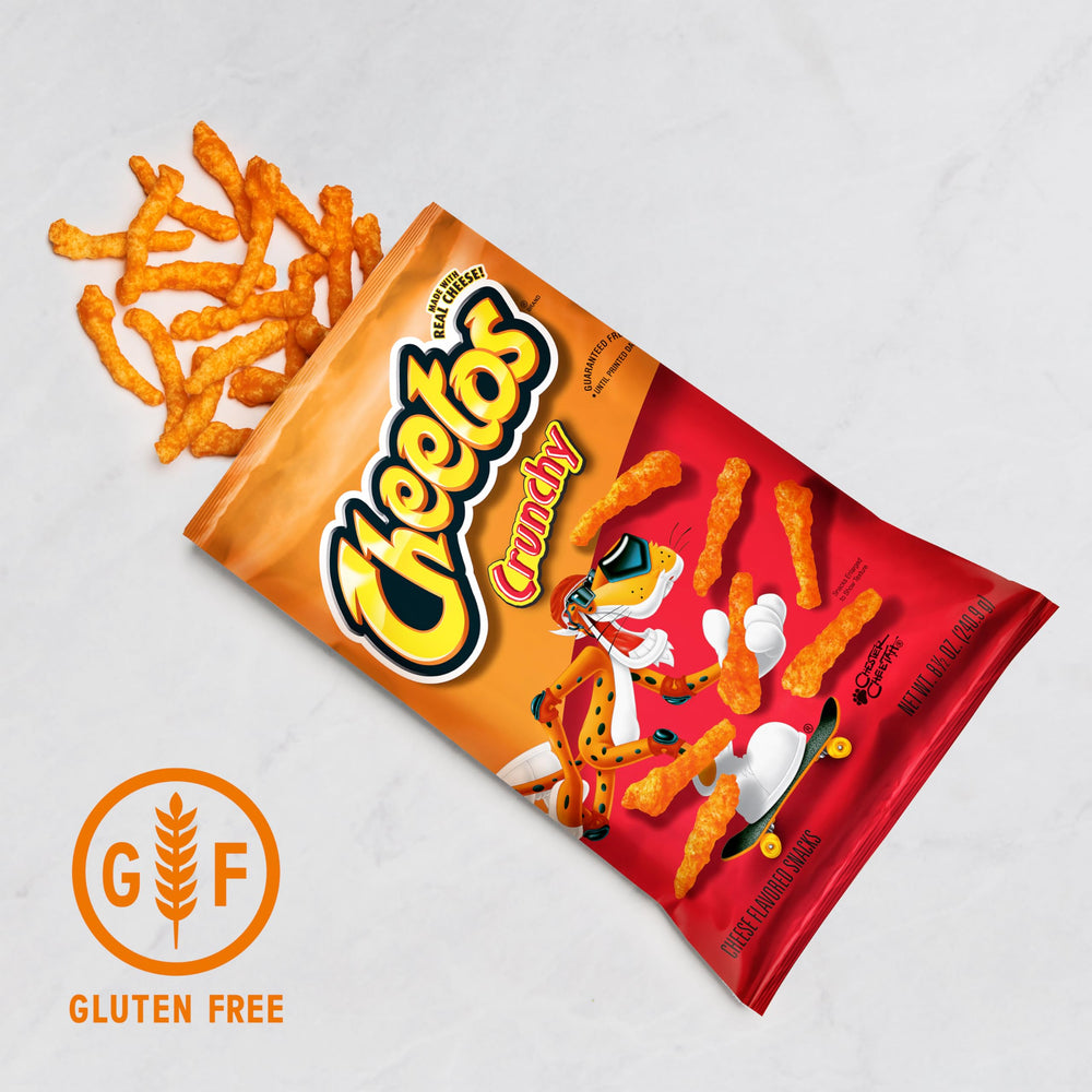 Cheetos single 1-ounce bag next to a ruler for scale, showing portion size and convenience