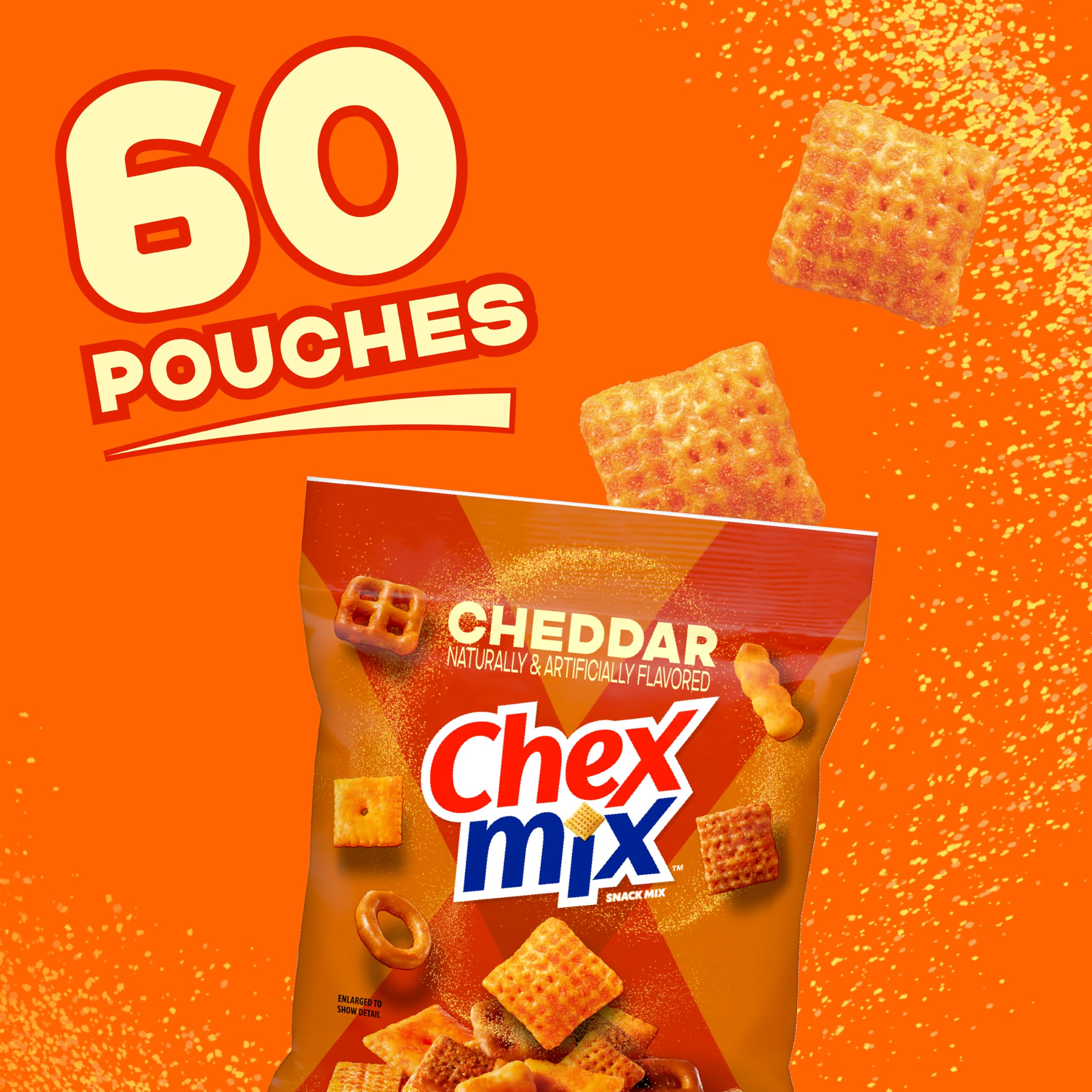 Close-up of Chex Mix pieces showing crunchy texture and cheddar coating
