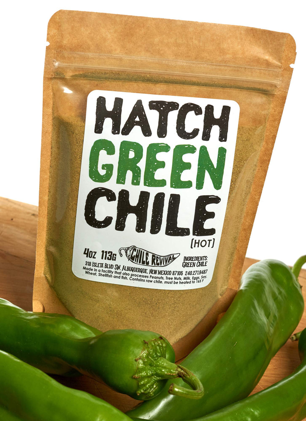 Chile Revival powder close-up on spoon revealing roasted green texture benefit